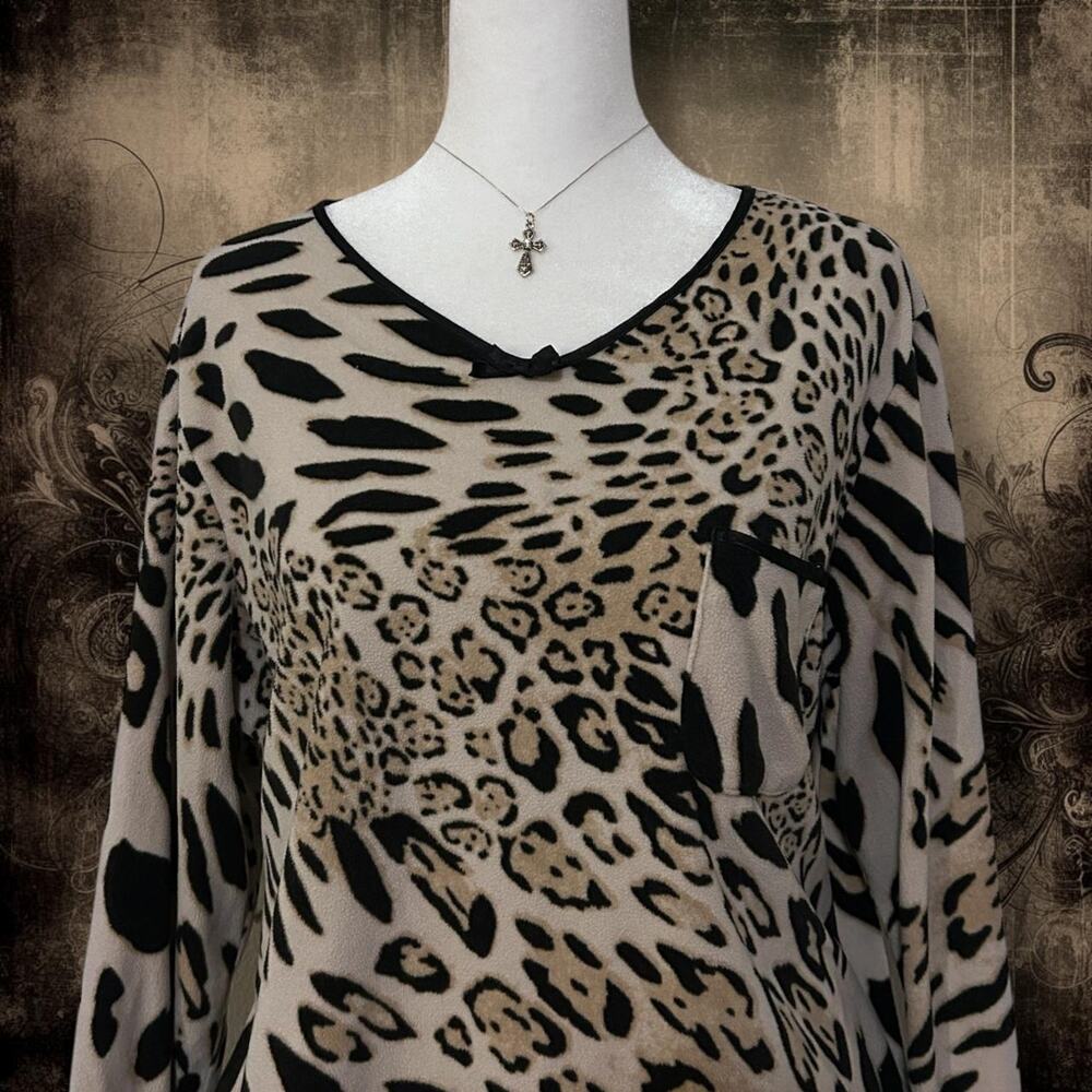 soft and cozy cream and black leopard print long sleeve top